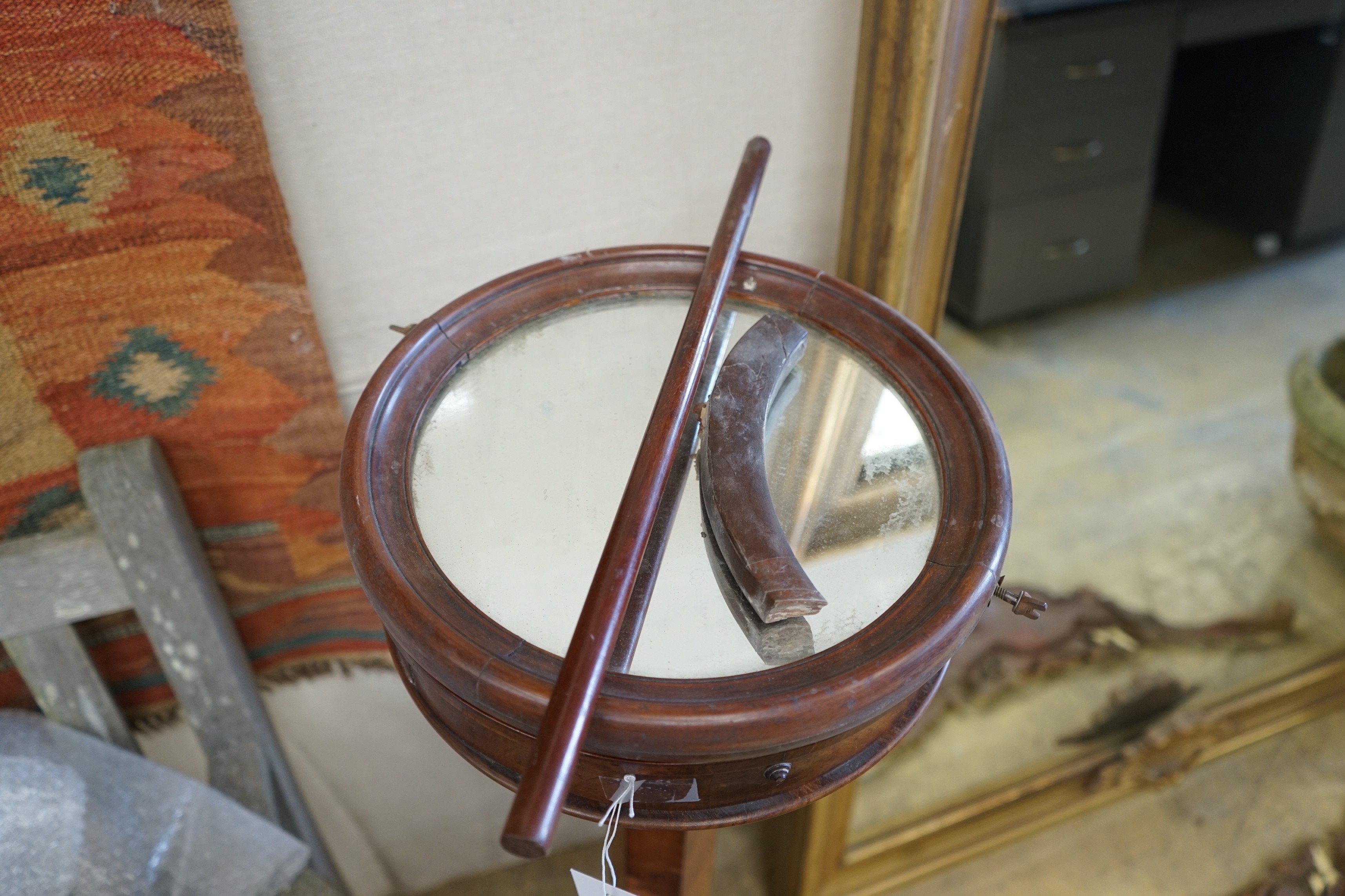 A Victorian mahogany shaving stand in need of restoration